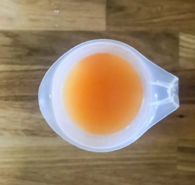 Eine Zitrusfruchtkonsistenz im Becher